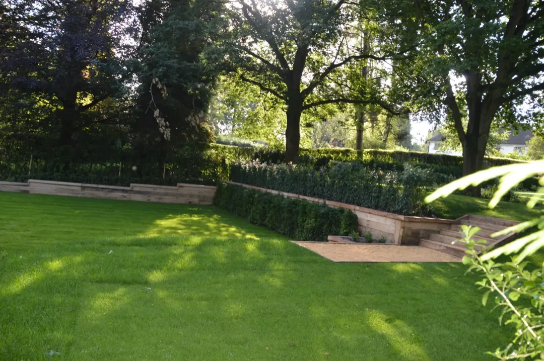 Garden lawn, wall and trees